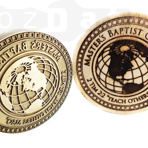 May include: Two round wooden stamps with the text "MASTER'S BAPTIST COLLEGE" and "2 TIM 2:2 'TEACH OTHERS ALSO'". One stamp is metal with a handle, the other is wood. Both feature a globe design.