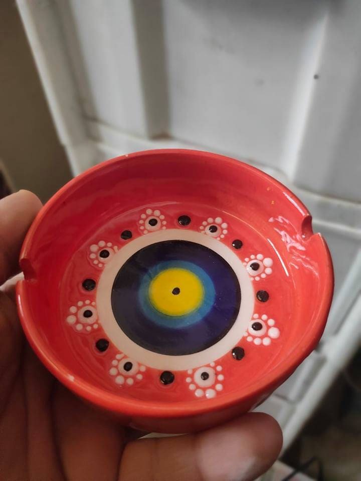 handmade cigarette ashtray with evil eye bead pattern