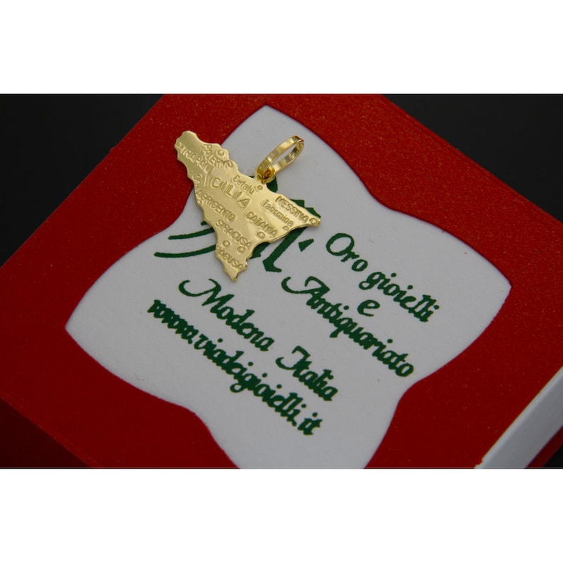 Pendant with gift box included.