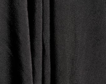 Semi-transparent black viscose knit, fluid, beautiful poise