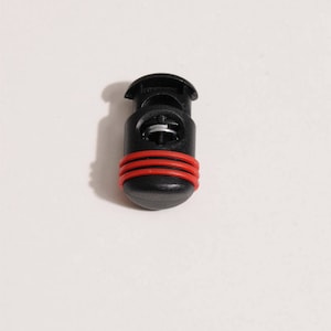 attache pour cordon 5 6 mm couleur noir et rouge 27 mm x 17 mm image 1