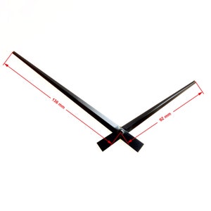 May include: Black clock hands with a 136 mm long minute hand and a 92 mm long hour hand.