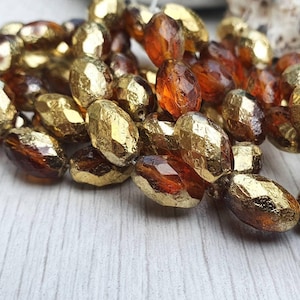 8 x 12mm Faceted Oval in Dark Honey with Gold and Etched Finishes  | Full Strand of 10 Beads