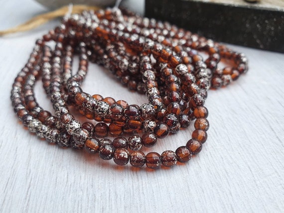 Buy 4mm Round Druk Root Beer With Mercury Finish | Full