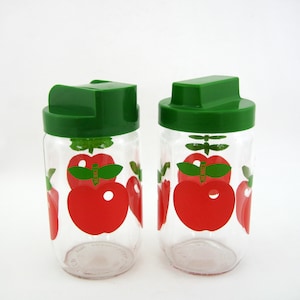 2 bocaux en verre transparent - décor pommes rouges - Henkel Hermeverre VMC France - vintage années 70