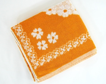 Handtuch aus Frottee-Baumwolle – weißes Blumenmuster auf orangefarbenem Hintergrund – Besana, hergestellt in Italien – Vintage 70er Jahre