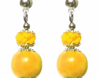 Small dangling stud earrings with wooden pearl and lemon yellow satin cord