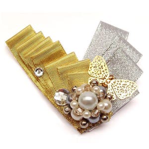 Gouden en zilveren vlinder- en parelbroche voor een feest of bruiloft