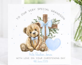 May include: A greeting card with a teddy bear, cross, and heart illustration. The card reads "TO OUR VERY SPECIAL GRANDSON" and includes the name "Arlo Reuben Jones" and the date "4th June 2026". The bear and heart are light blue.