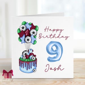 May include: A white card with a blue and white cake decorated with footballs and balloons. The card says "Happy Birthday 9 Josh" in maroon lettering.
