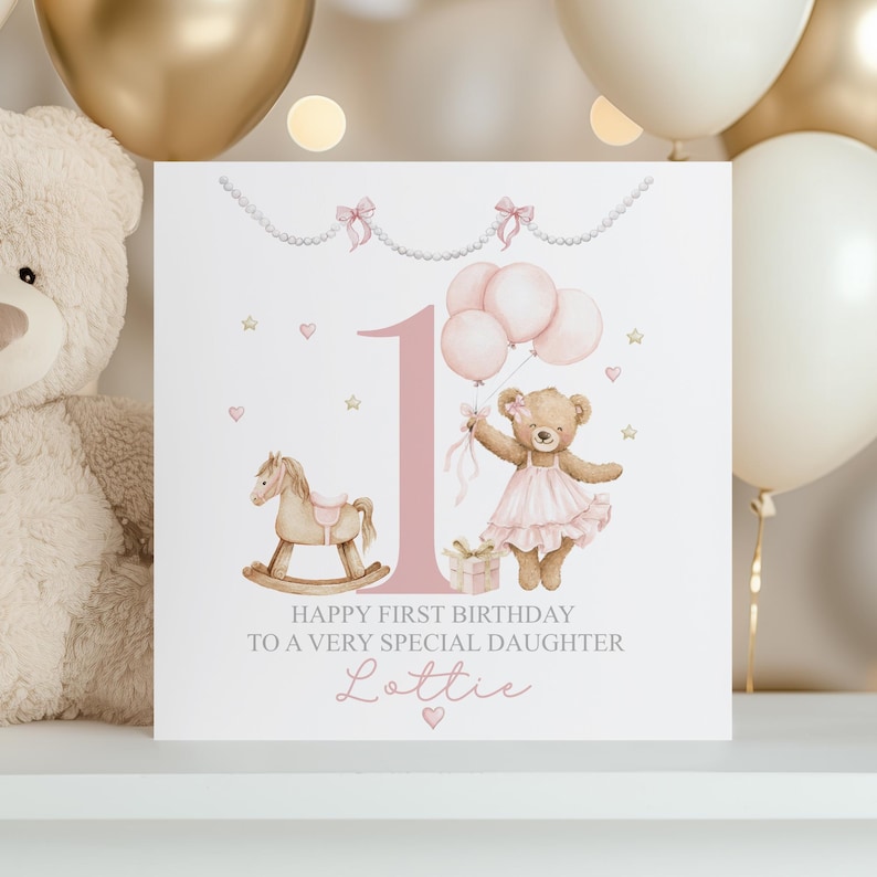Personalised pink first birthday card featuring a cute teddy bear in a tutu holding balloons, rocking horse, gold stars, pink bows, and the number one. Text reads “Happy First Birthday to a Very Special Daughter/Granddaughter/Any relation ” Ideal for baby girl’s first birthday.