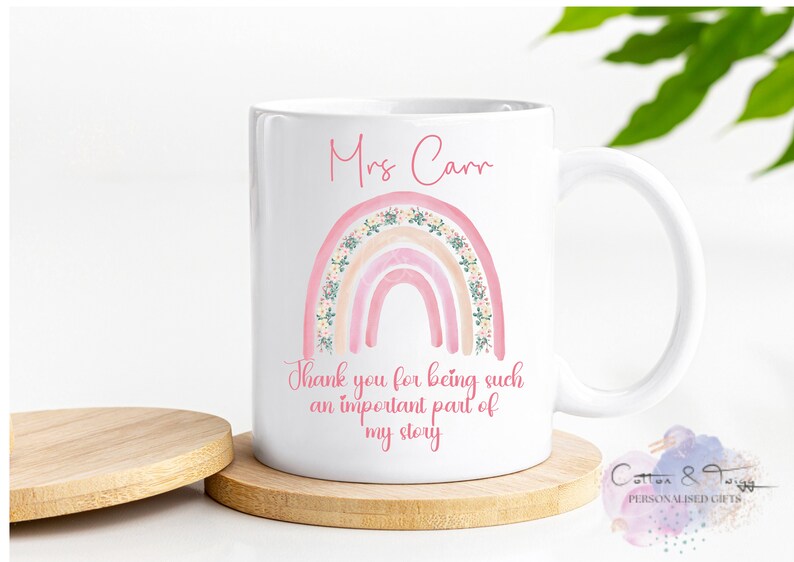 May include: White ceramic mug with a pink and peach rainbow design and floral accents. The text "Mrs. Carr" and "Thank you for being such an important part of my story" is printed on the mug.