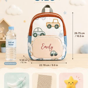 May include: A backpack with a white base featuring a pattern of embroidered cars, a rust-colored top, and blue sides. The front pocket is beige with the name Emily embroidered in red. It measures 10.5 inches high and 9.0 inches wide.