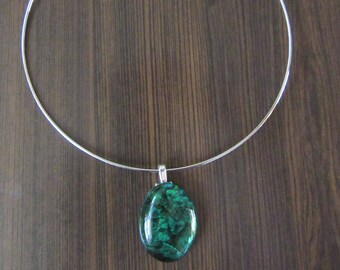 Oval green marble and paper pendant on neck wire