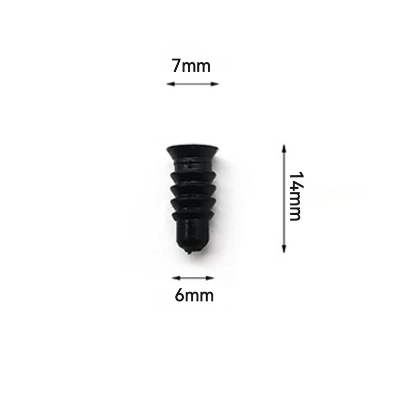 May include: A black plastic wall anchor, 14mm long, 7mm wide, and 6mm in diameter. The anchor has a ribbed design for secure installation. Ideal for use with screws in drywall or other materials.