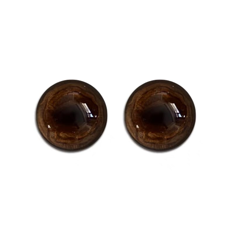 Op de afbeelding: Twee bruine plastic veiligheidsogen voor knutselen. De ogen hebben een donkerbruine iris en een zwarte pupil.