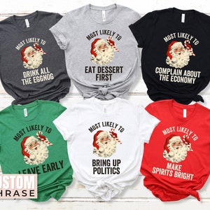May include: Six different Christmas t-shirts featuring a vintage Santa Claus illustration with a candy cane. Each shirt has a different phrase, including "Most Likely To Drink All The Eggnog", "Most Likely To Eat Dessert First", "Most Likely To Complain About The Economy", "Most Likely To Leave Early", "Most Likely To Bring Up Politics", and "Most Likely To Make Spirits Bright".