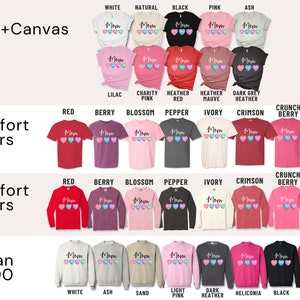 May include: A chart showing different t-shirt and sweatshirt styles and colors available for purchase. The chart includes the brand names Bella+Canvas, Comfort Colors, and Gildan, along with the corresponding product numbers. The chart also includes a variety of colors, including red, berry, blossom, pepper, ivory, crimson, crunch berry, violet, white, natural, black, pink, ash, lilac, charity, heather, mauve, dark grey, and sand.