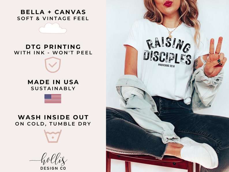 May include: White t-shirt with black text that reads "Raising Disciples Proverbs 22:6". The shirt is being worn by a person sitting on a stool. The person is wearing a denim jacket and black jeans.