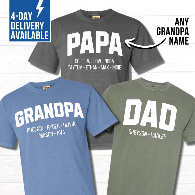 May include: Three t-shirts with different designs and text. The first shirt is gray with the word "PAPA" in white letters and a list of names below. The second shirt is blue with the word "GRANDPA" in white letters and a list of names below. The third shirt is green with the word "DAD" in white letters and a list of names below.