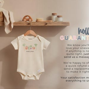 May include: A rustic wooden sign with the text "Welcome to our home" in white lettering. The sign features a distressed finish and a simple, inviting design, perfect for entryway decor.