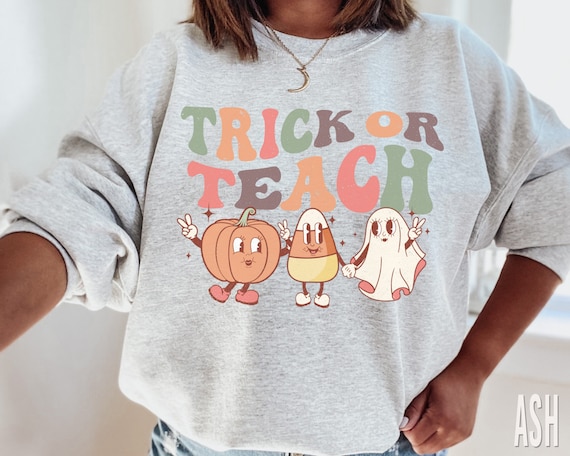 Trick Or Teach Teacher Halloween T-Shirt Trick Or Teach Teacher Halloween T-Shirt