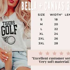 May include: Grey heather athletic t-shirt with black text that reads "TIGERS GOLF" and a golf ball graphic. Size chart with measurements in inches. "Excellent customer service. Very soft material."