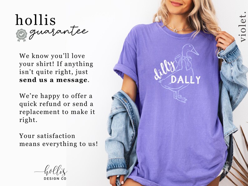 May include: A violet t-shirt featuring a white duck graphic and the words "dilly DALLY". The shirt has a casual fit and short sleeves. The image also displays the text "hollis guarantee".