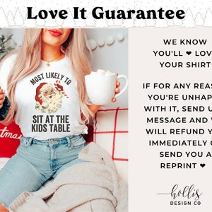 May include: White t-shirt featuring a vintage illustration of Santa Claus and the text "Most Likely To Sit At The Kids Table". The image is set against a background of a person wearing the shirt and holding a mug.
