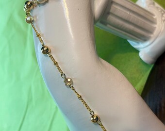Gouden handketting met zeeparel, elegante sieraden met kralen