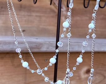 Gewoon boog-statische howlietkristallen lenzenvloeistofketting, handgemaakte glazen houder met kralen
