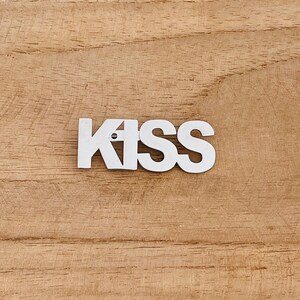 Stainless steel brooch Amour, Kiss, Love KISS