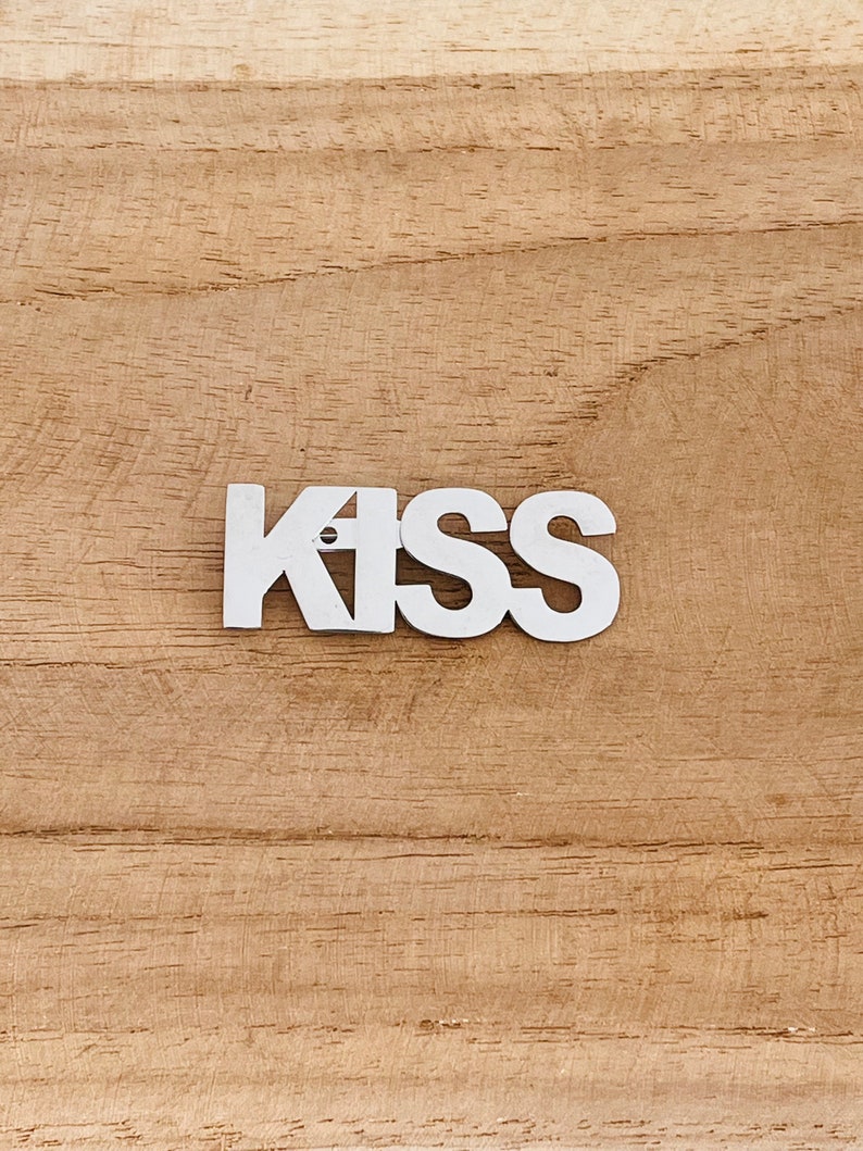 Stainless steel brooch Amour, Kiss, Love KISS