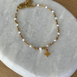 Thin minimalist bracelet in gold stainless steel with small star image 5