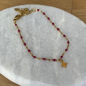 Thin minimalist bracelet in gold stainless steel with small star image 10