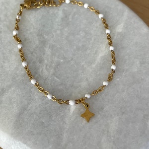Thin minimalist bracelet in gold stainless steel with small star image 6