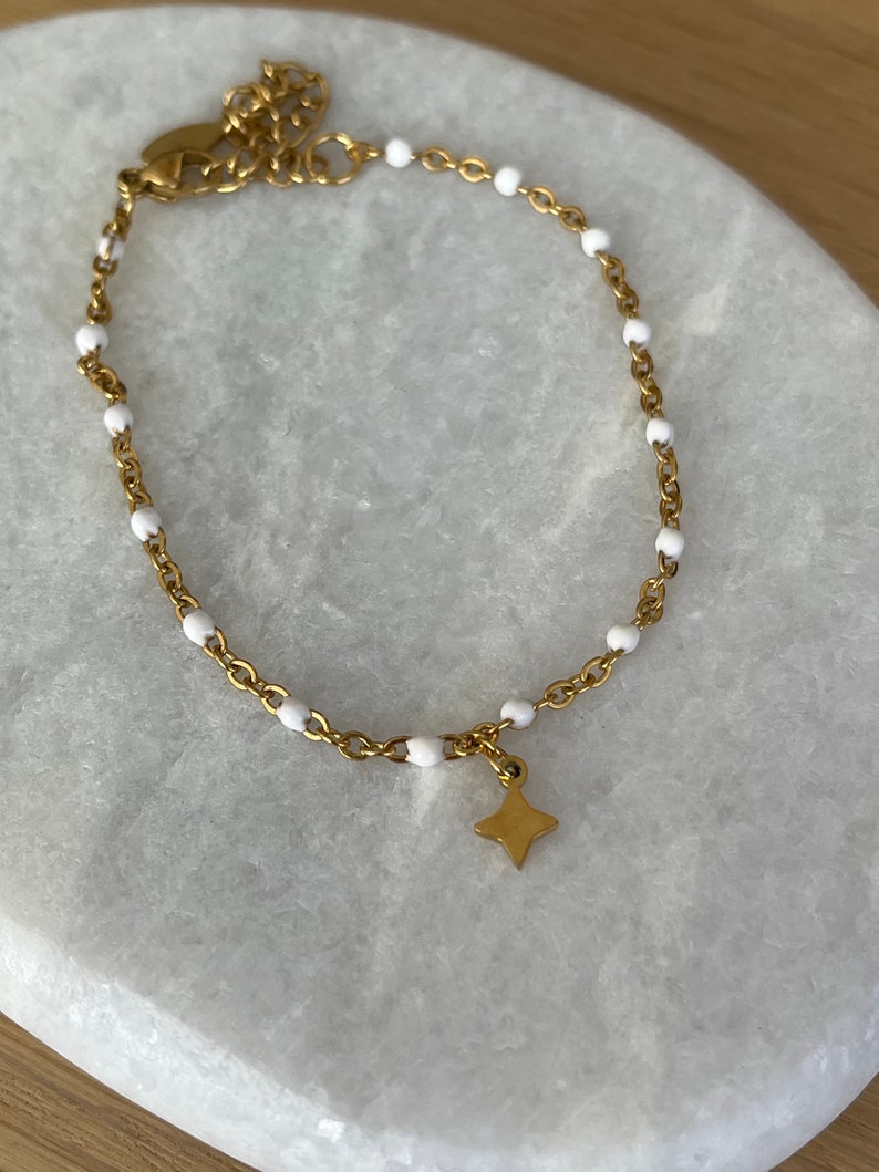 Thin minimalist bracelet in gold stainless steel with small star image 6