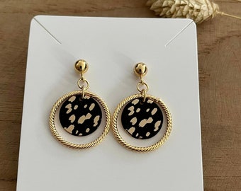 Gold and black stud earrings