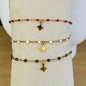 Thin minimalist bracelet in gold stainless steel with small star image 1