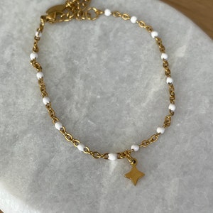 Thin minimalist bracelet in gold stainless steel with small star Blanc