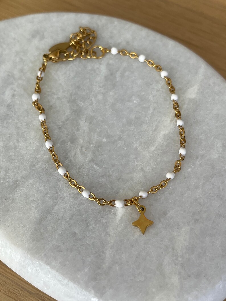 Thin minimalist bracelet in gold stainless steel with small star Blanc