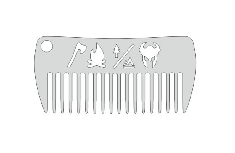May include: A silver comb with a variety of symbols including an axe, a fire, a tree, a campfire, and a Viking helmet.