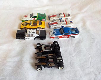 Chasis y 6 carrocerías para coches de slot HO vintage Aurora AFX AMRAC
