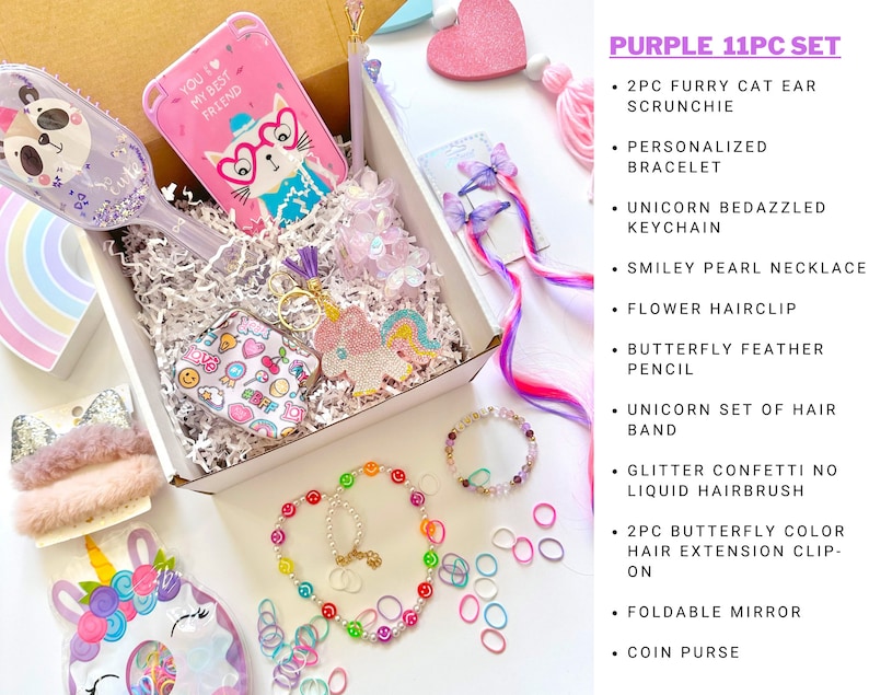 May include: A purple 11-piece gift set containing a brush, keychain, bracelet, and hair accessories. The set features a variety of colourful items with unicorn and cat themes. The text "YOU ARE MY BEST FRIEND" is visible on a pink phone case.