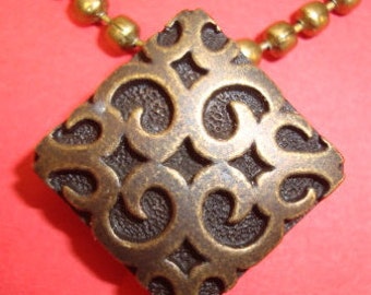 Sophia Bronze Pendant only, chain not included.