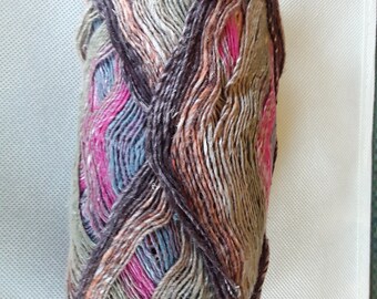 Noro Sock Yarn colored with a mix of pinks, browns with a hint of orange