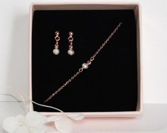 Parure de bijoux en perle blanche, parure d'un bracelet et d'une paire de boucles d'oreilles en perle, bijoux de mariée.