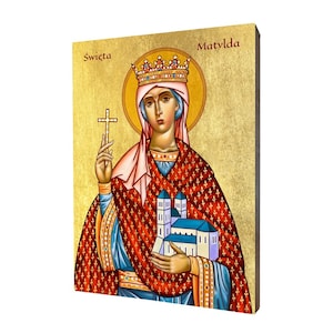 Può includere: Un'icona religiosa che raffigura Santa Matilde, una donna che indossa una corona e una veste rossa e blu, tenendo una croce e un modello di una chiesa. L'icona ha uno sfondo dorato e il testo "Święta Matylda" è scritto in alto a sinistra e a destra.