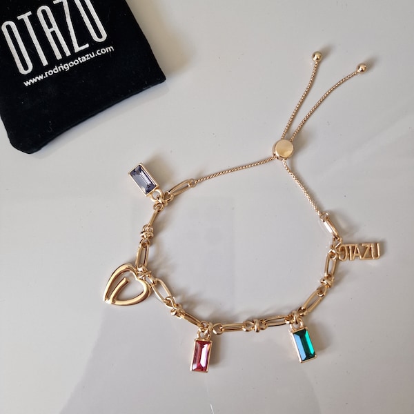 OTAZU gold plated charm bracelet, vintage exclusives gem crystals gouden bedelarmband charms, unused, adjustable size