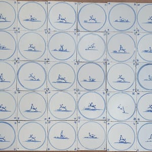 40 x Field of antique Dutch Delft circle tiles with animals, 18th century antique delft blue circle tile, springertjes, backsplash build in
